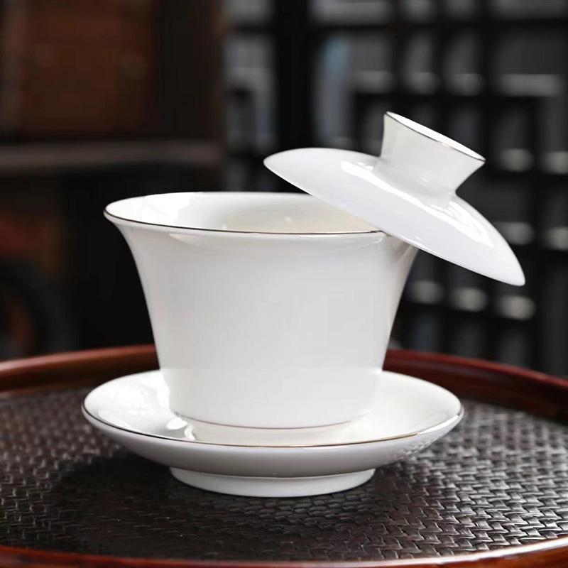 

Новый ледяно-белый фарфоровый серебряный дракон парящий Саньцай крышка-чаша Кунг-фу чайный набор для дома и офиса легкая роскошь высококачественная чайная чашка