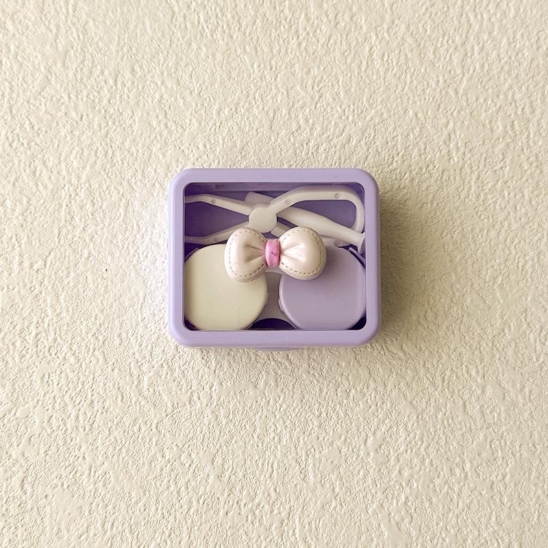 Bonbonfarbene Kontaktlinsenbox Niedliche Schleife Tragbarer Kontaktlinsenbehälter mit Pinzette Saugstab Set für Reise-Kit-Halter