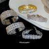 Metal diamond-set round opening bracelet, court style niche temperament bracelet, light luxury and high-end jewelry.