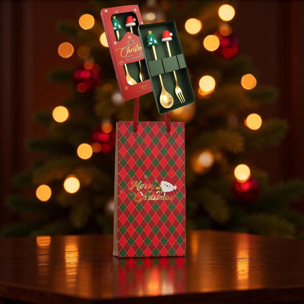 Christmas Cartoon Cutlery Set: Forks, Spoons, and Gift Box Featuring Cute Reindeer and Tree Designs.