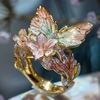 Anello aperto a forma di farfalla e fiore in lega alla moda con strass incastonati per donna