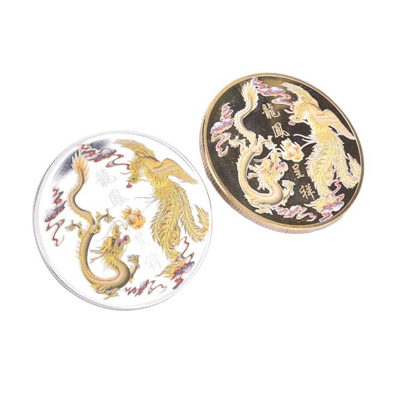 Velstand brakt av dragen og phoenix minnemynt Tradisjonell