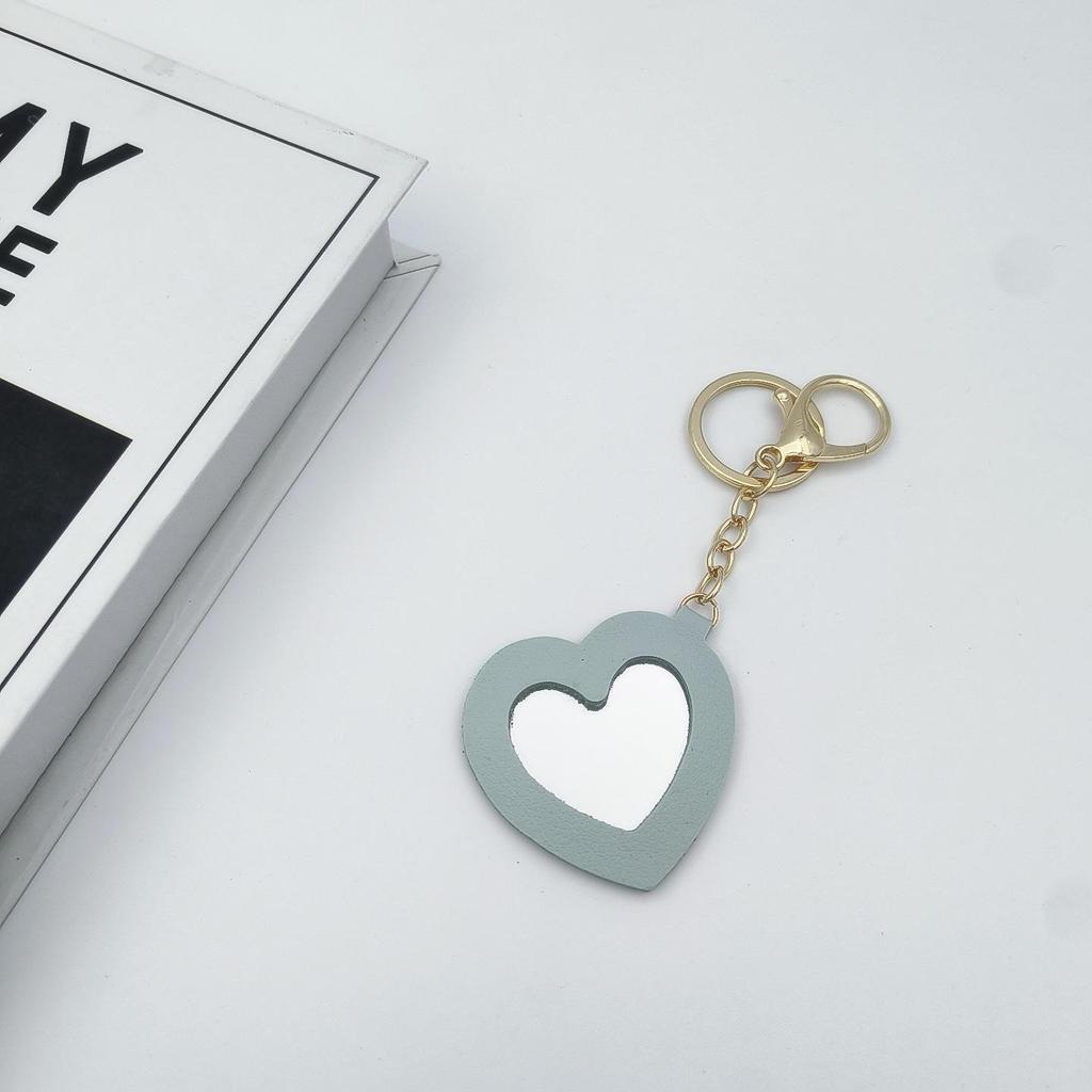 Přenosné pouzdro na rtěnku ve tvaru srdce s ochrannou kůží a roztomilou klíčenkou s přívěskem