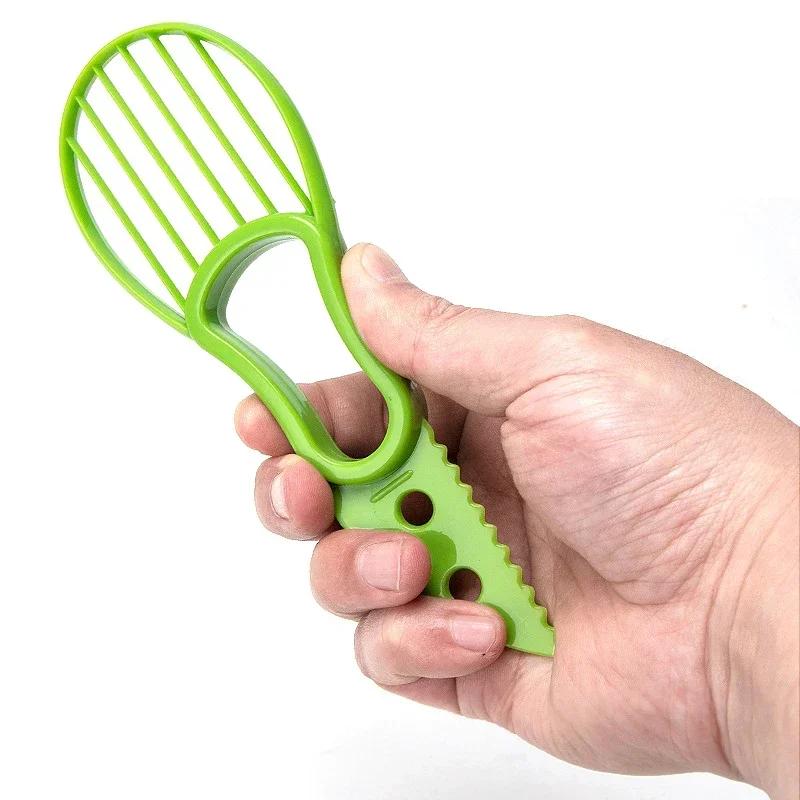 3 In 1 Avocado-Schneider Shea-Entkerner Butterfrucht-Schäler Schneider Fruchtfleisch-Separator Kunststoffmesser Küchengemüsewerkzeuge