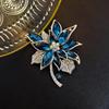 Elegant Rhinestone Animal Brooch: High-End Flower Design for Women's Coats and Accessories