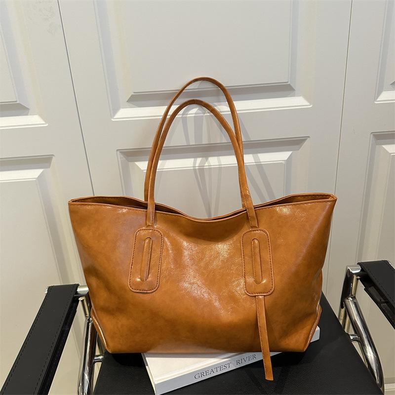 

Мягкая кожаная текстура новая модная сумка подмышку повседневная сумка трендовая простая большая вместимость сумка-тоут портативная женская сумка оранжевый