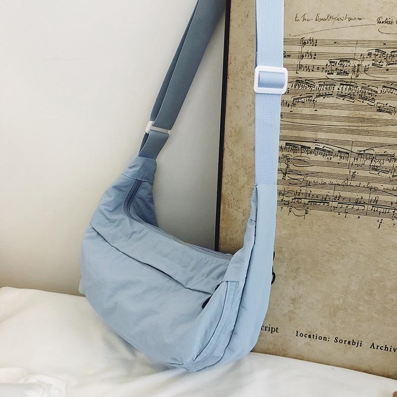 Casual crossbody bag girls lightweight shoulder canvas bag waterproof commuting solid color versatile nylon dumpling bag for men