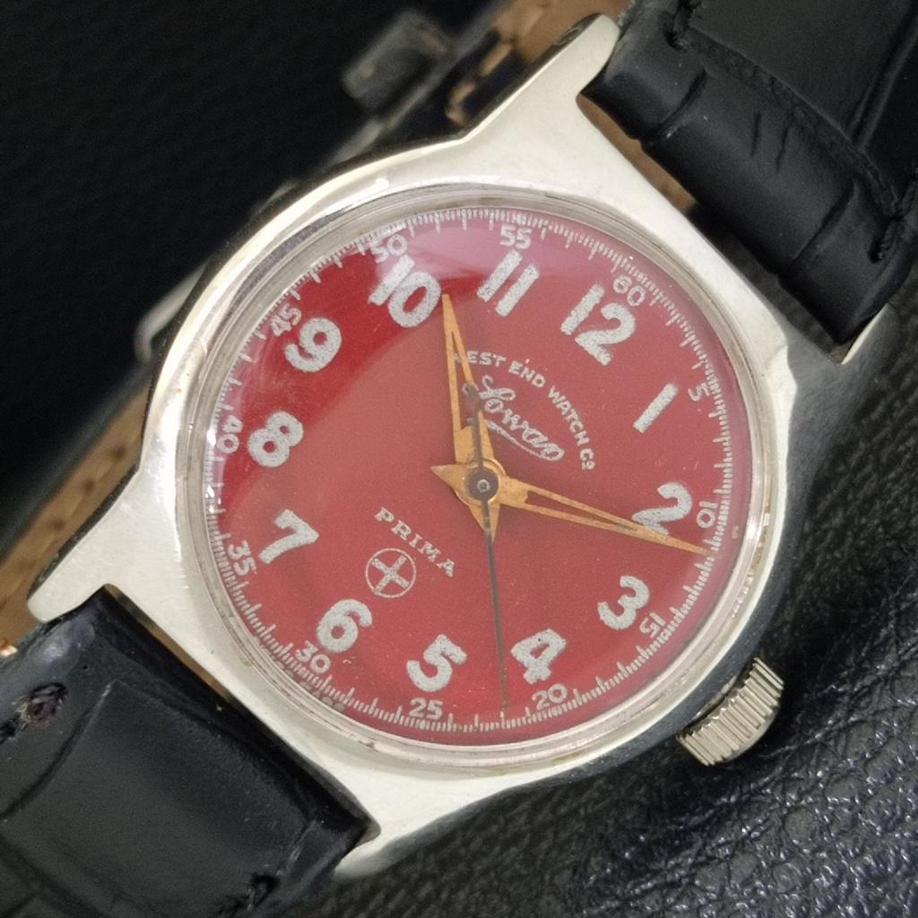 

HAND-WINDING VINTAGE WEST END WATCH CO SWISS BOY RED DIAL WATCH a703798-1 R213e-a703798