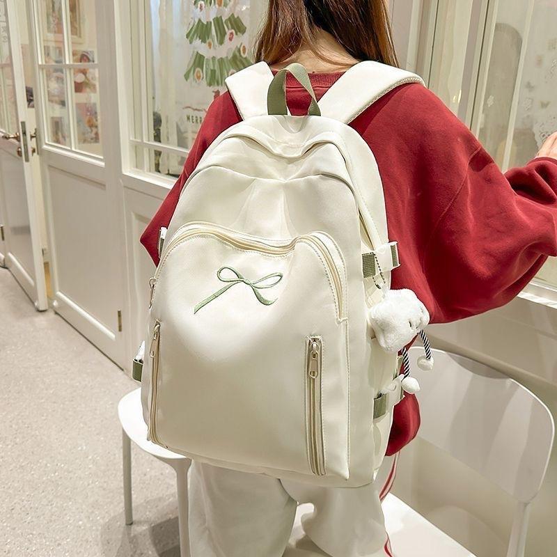 Schoolbag Korean version ins solid color sweet bow backpack bag women's small fresh student schoolbag large capacity casual backpack