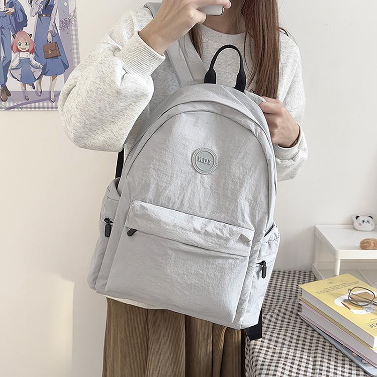 Schoolbagins Lazy style schoolbag female simple junior high school college student backpack Korean version tide Japanese leisure travel backpack