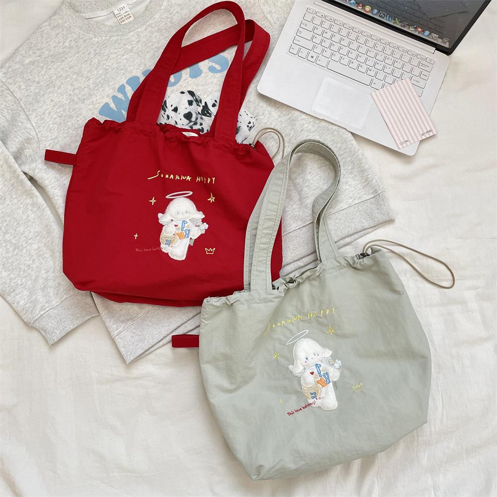 Canvas bag Large capacity women's embroidery lamb fabric bag Simple versatile drawstring bundle shoulder bag