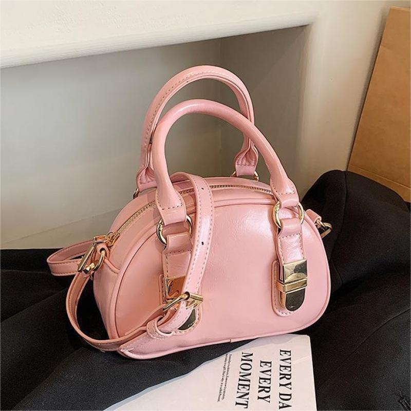 Korean portable bowling bag women's 2025 new niche retro shell bag high-end versatile messenger bag