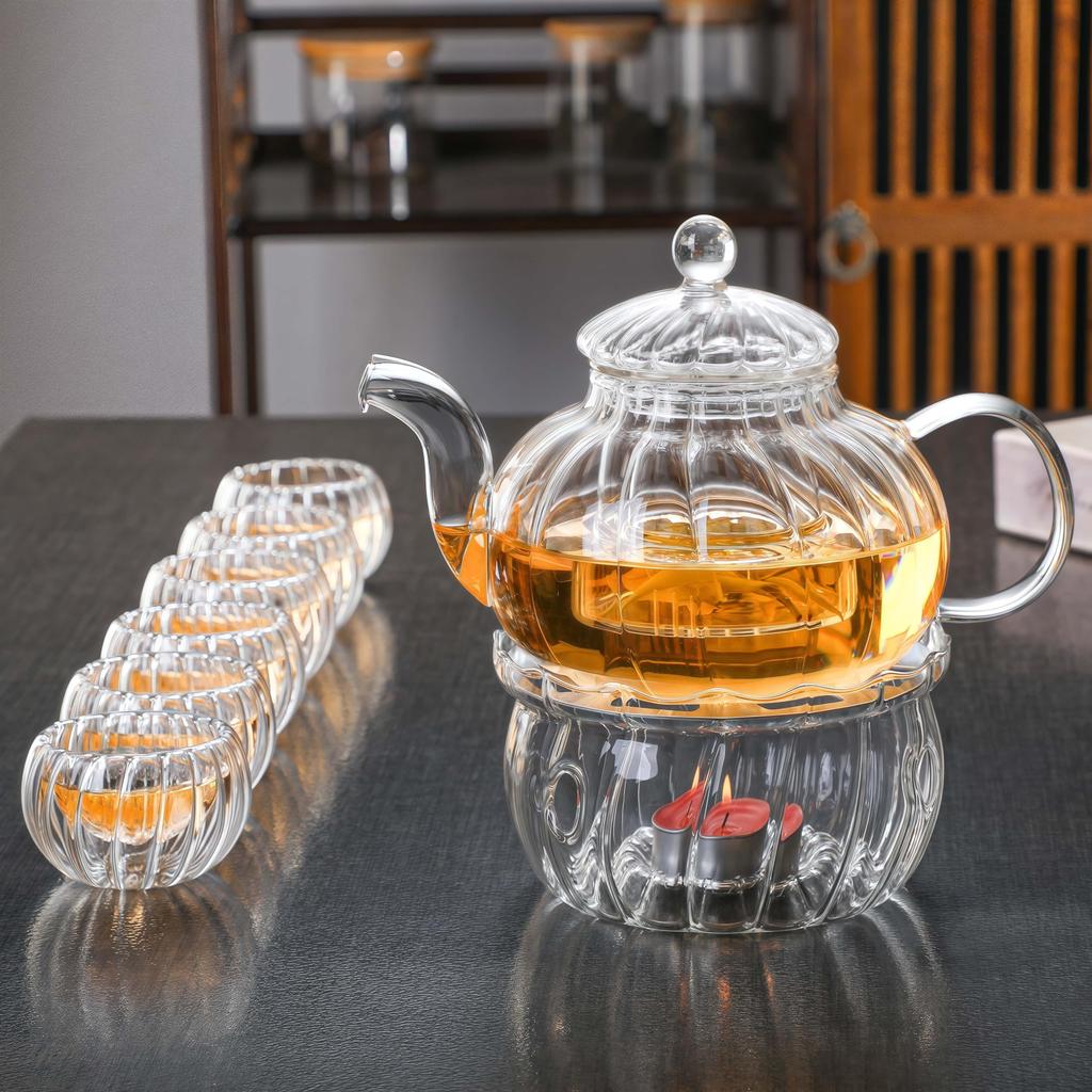 Transparent Pumpkin-Shaped Glass Teapot and Tea Warmer Set, 600ml Capacity, Includes Tea Strainer, Teapot, Pot Warmer, and Candle Holder. Stylish