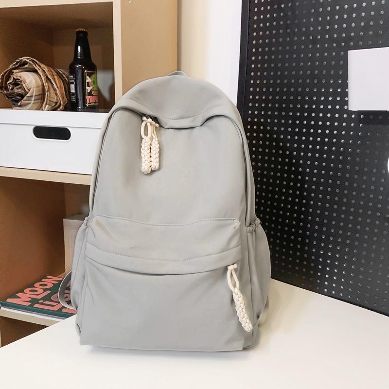 Schoolbag new Japanese ins solid color backpack Korean version ins small fresh college style junior high school student versatile backpack