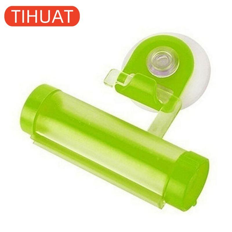 Plastic Device - A Suction Cup Press for Convenient Storage and Uniform Squeezing of Toothpaste Tubes