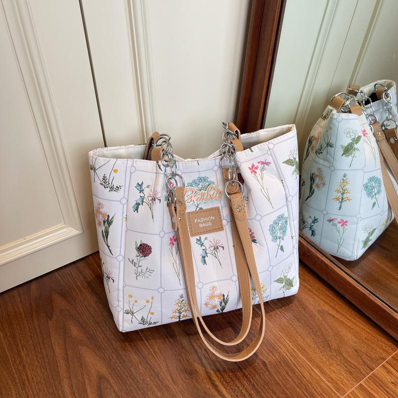 

Large capacity bag women s 2025 new high-end texture canvas printing shoulder bag niche simple versatile tote bag білий