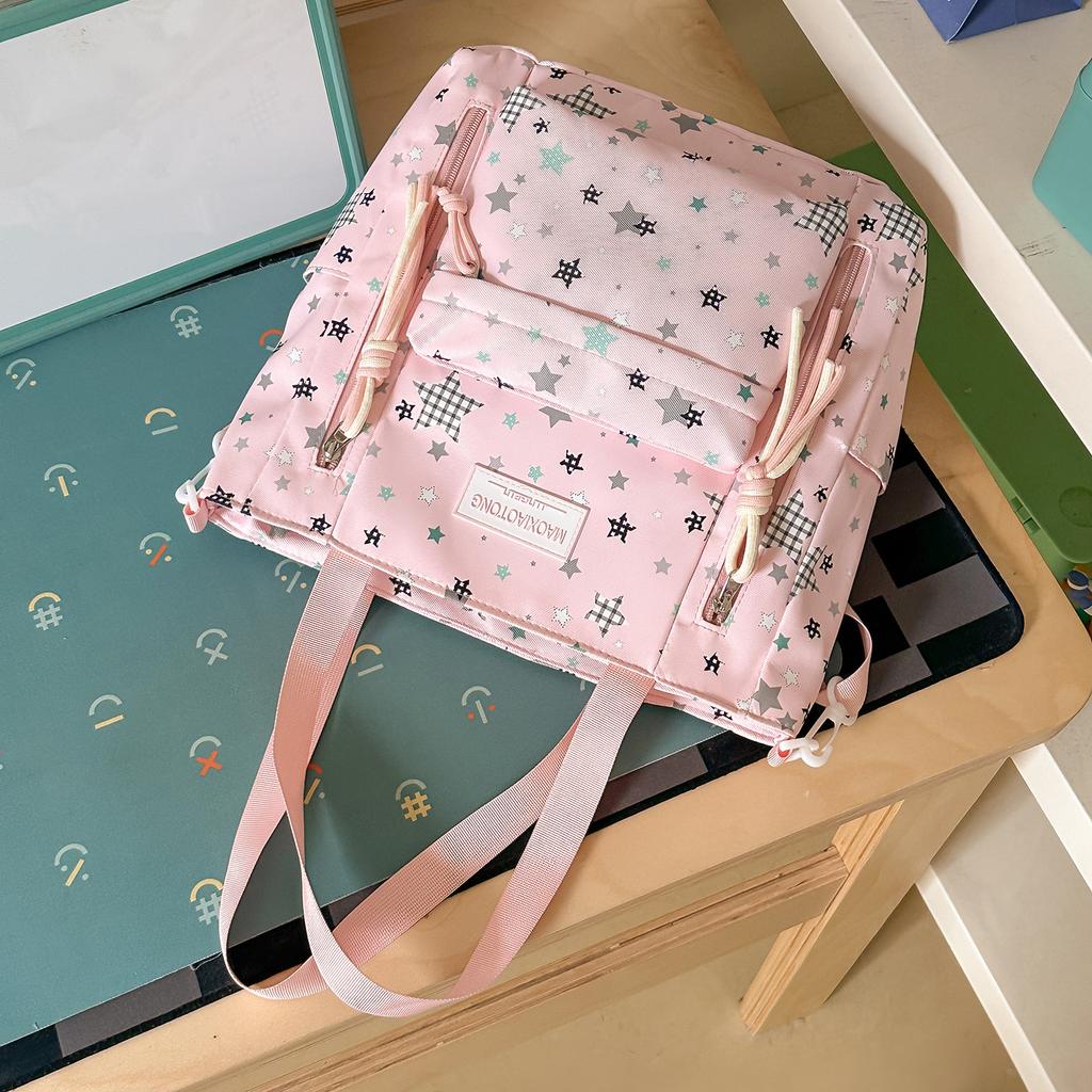 Schoolbag small fresh student schoolbag female ins cartoon star printing junior high school student large capacity backpack burden reduction spine bag