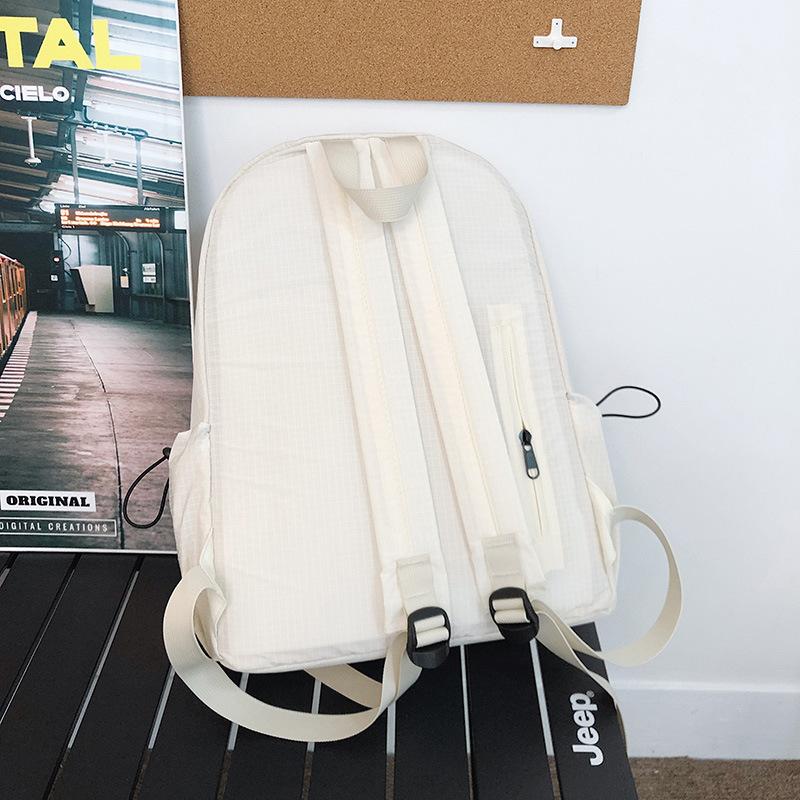 School bag Korean version ins high value backpack early high birth girl casual simple commute versatile large capacity