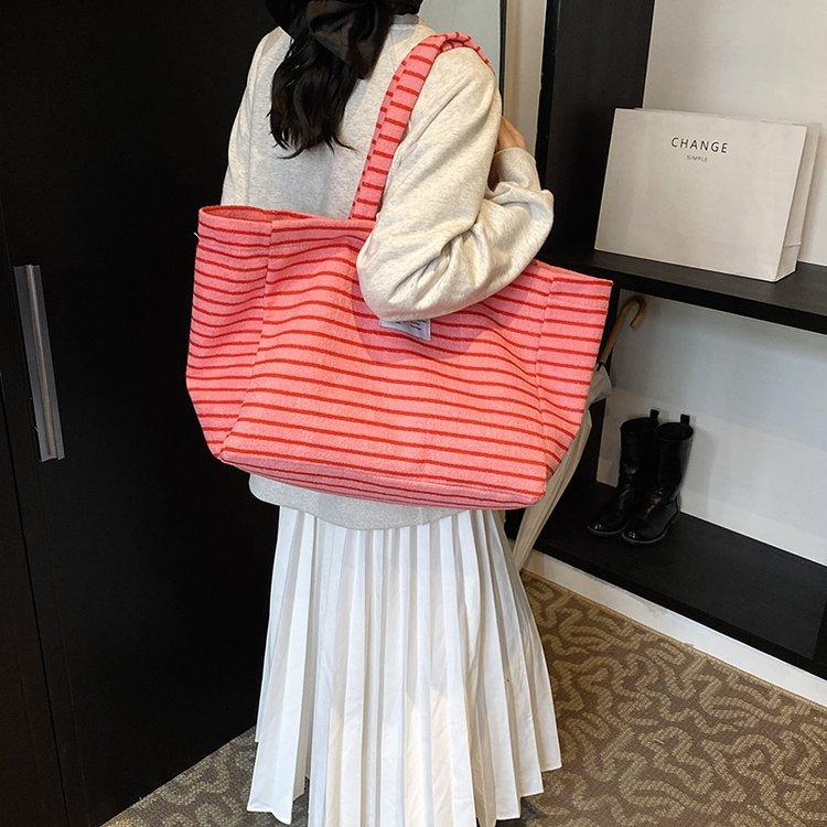 Nischen-Streifen-Tragetasche, lässiger Stil, guter Pendelpartner