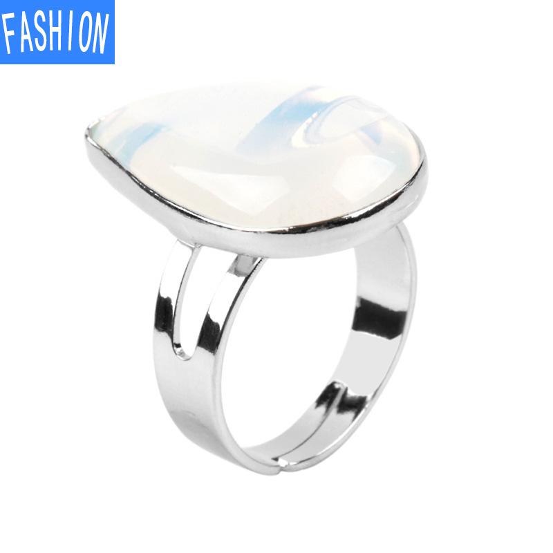 

Кільця з полірованого натурального кришталю у формі краплі води Opal