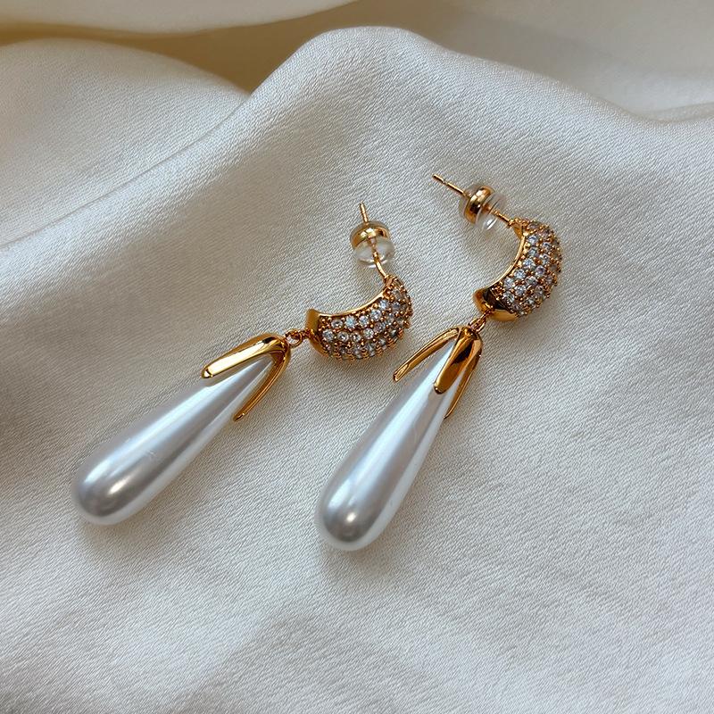 

925 sterling silver needle water drop pearl earrings women s light luxury temperament high-end stud earrings retro design ear jewelry