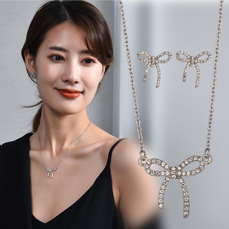 Chic Titanium Steel Bow Pendant Necklace For Women With Dazzling Diamond Inlay