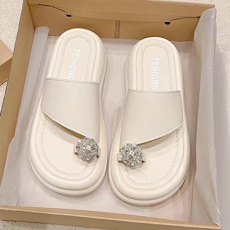 

Beach slippers women s outer wear 2025 new summer temperament fashionable versatile rhinestone heightening non-slip cover toe sandals women 40