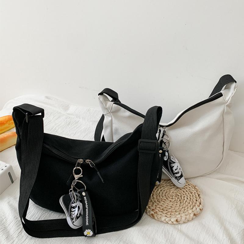 Versione coreana della borsa a tracolla da donna in tela tinta unita per studenti Borsa a tracolla minimalista Harajuku Hong Kong Wind Wind nero scuro con marea