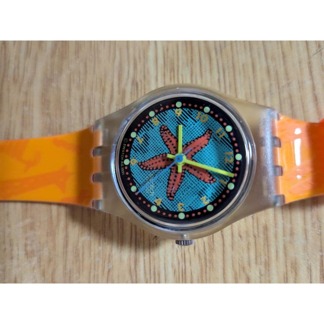 Used Swatch watch with starfish design movement case