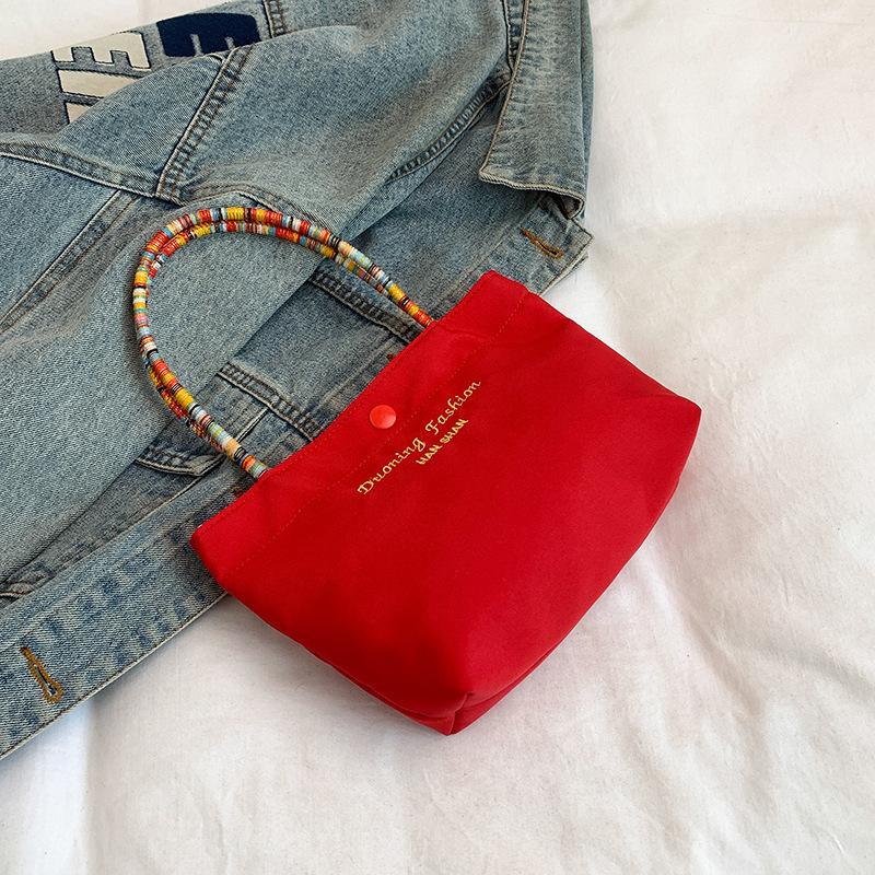 

2025 new letter-printed American retro large-capacity shoulder bag simple commuter beaded portable tote bag красный