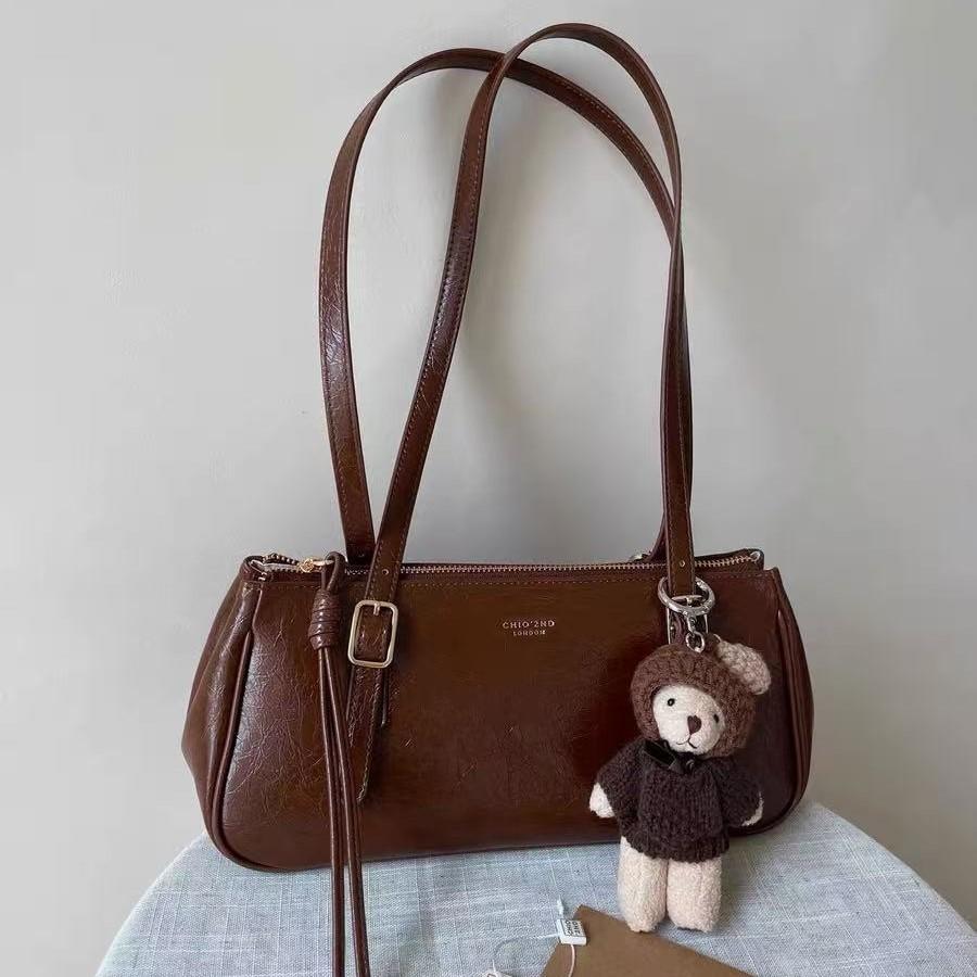 

Nanfeng new product, western traveler pillow bag, women s textured commuter handbag, shoulder armpit bag