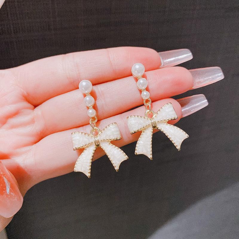 Silver Needle New Super Fairy Temperament Bow Earrings Women's Light Luxury Niche Versatile Pearl Stud Earrings