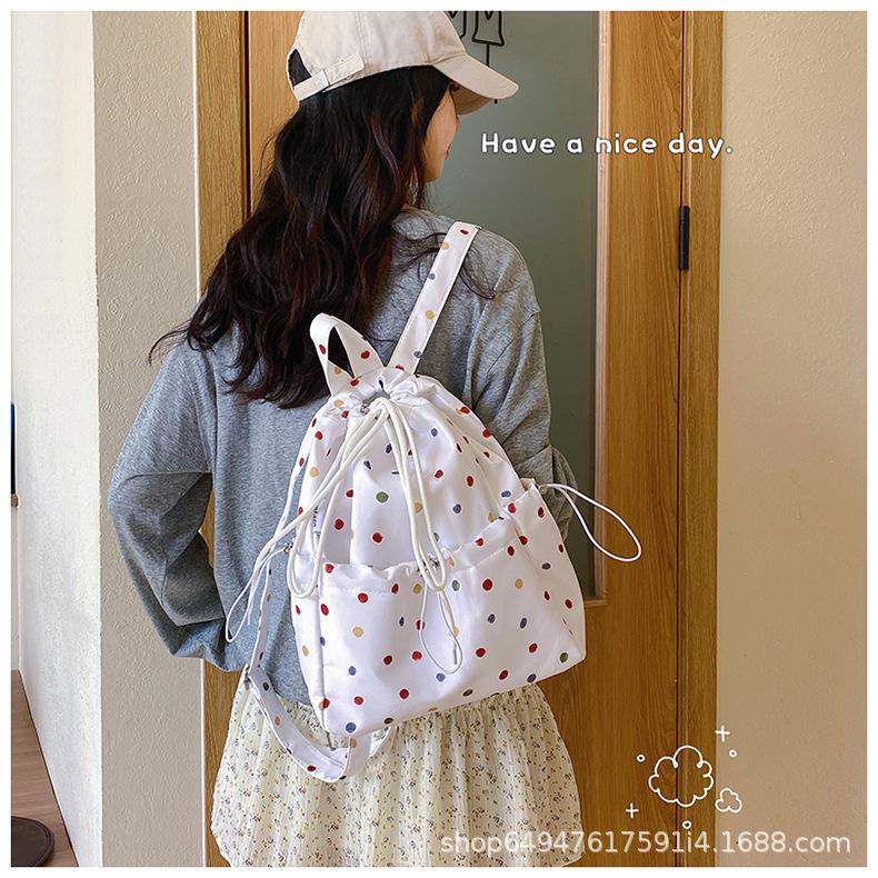 Korean Style Polka Dot Drawstring Women's Casual Backpack - Versatile, Lightweight, and Perfect for Outings or Sports.