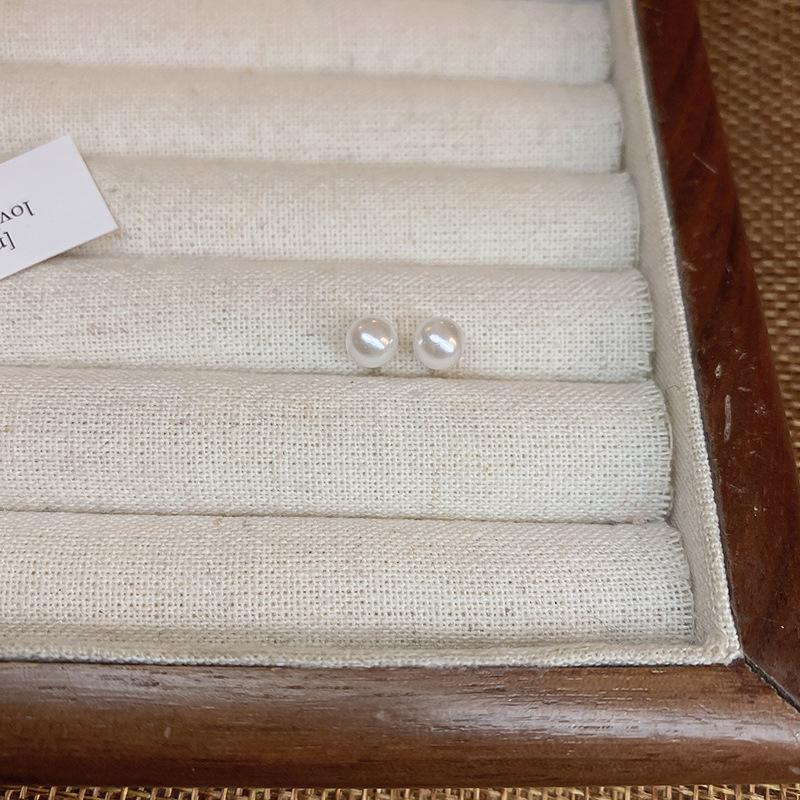 Silver needle fashion simple pearl stud earrings French retro high-end earrings Korean ins niche light luxury earrings women