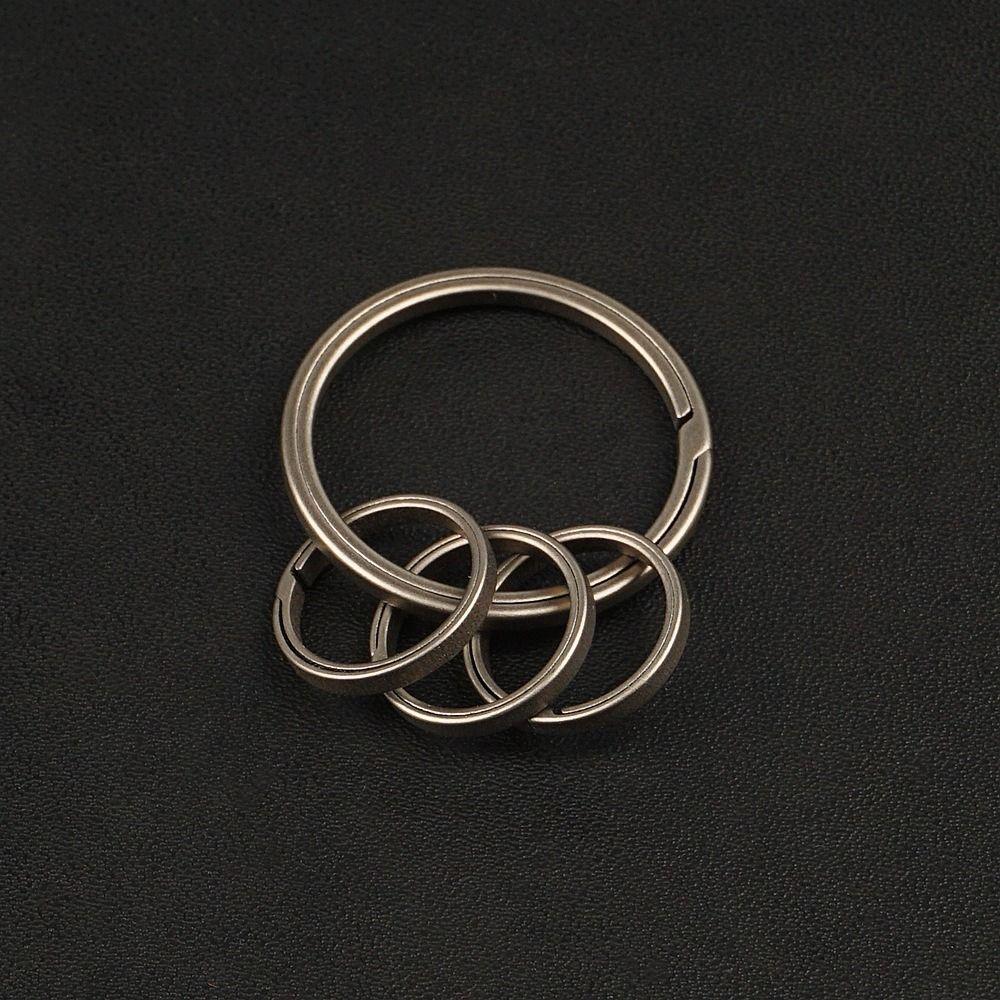4pcs Ultra-light Titanium Alloy Key Ring Hard Man Car Keychain Creative Side Pushing Rings  Gift