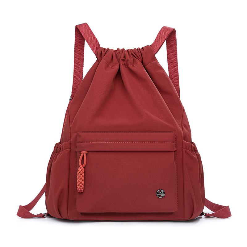 

Водонепроницаемый карман на шнурке Женский спортивный рюкзак Дорожный рюкзак красный