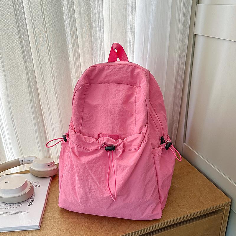 Korean drawstring lightweight backpack female versatile commuter simple class student schoolbag outdoor sports backpack розы красного