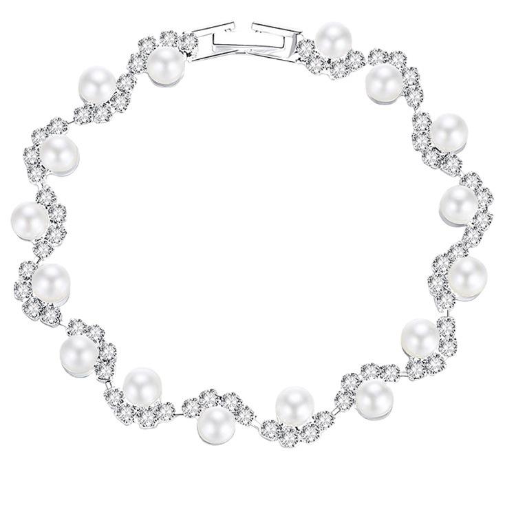 Стильные и элегантные браслеты со сверкающим жемчугом и стразами — фото 6