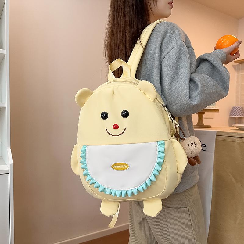 Schultasche niedlicher Cartoon Ins-Stil neuer Schal Bär Rucksack Mädchen Grundschule Kindergarten große Kapazität Schülerrucksack
