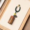 Hexagonal Jujube Wood Pendant with Red Sand - Wealth Attraction and Protection Ornament.