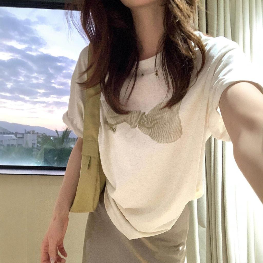 Korean apricot bow print short-sleeved T-shirt women's summer new loose and versatile slim crew neck top