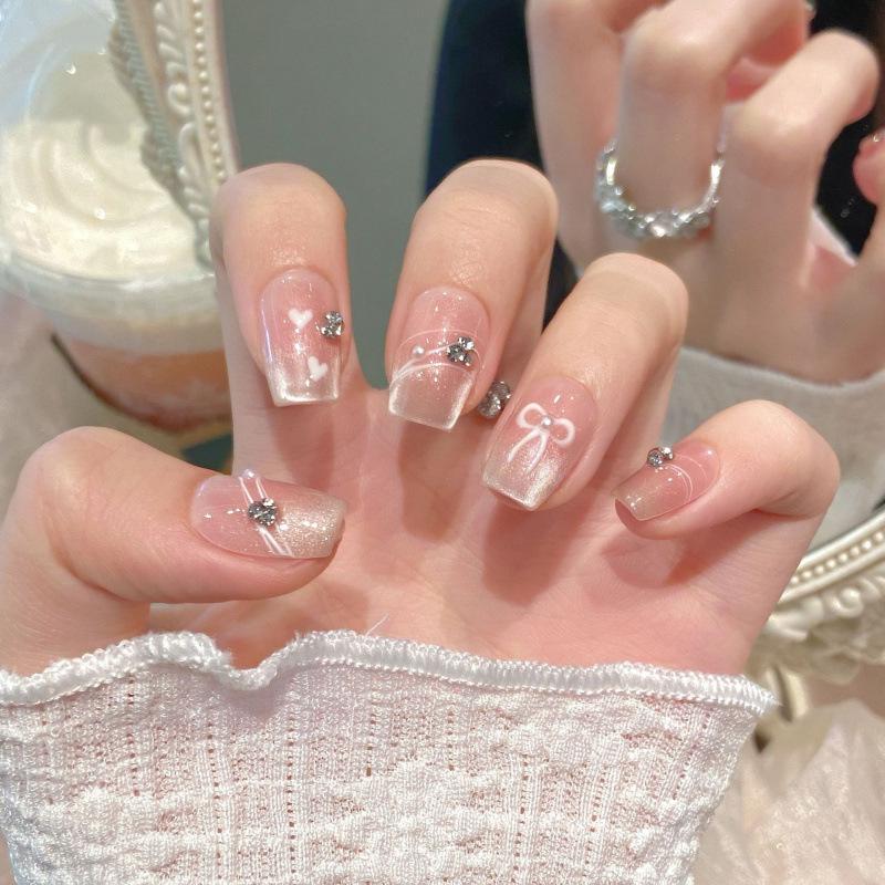 Gentle Blush Gradient Cat Eye Manicure with Butterfly Accents