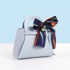 Europäische Handtasche aus PU-Leder im leichten Luxus-Stil & Süßigkeiten-Geschenkbox