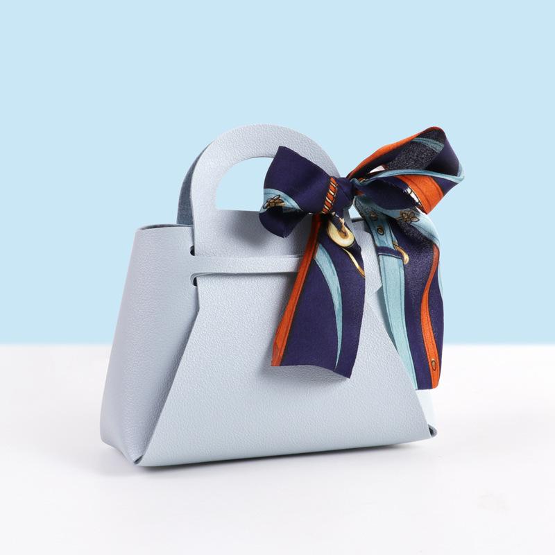 Europäische Handtasche aus PU-Leder im leichten Luxus-Stil & Süßigkeiten-Geschenkbox