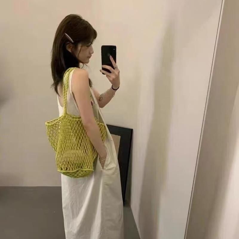 Sac de plage tissé creux design de niche d'été pour femmes nouveau sac à bandoulière en maille grande capacité