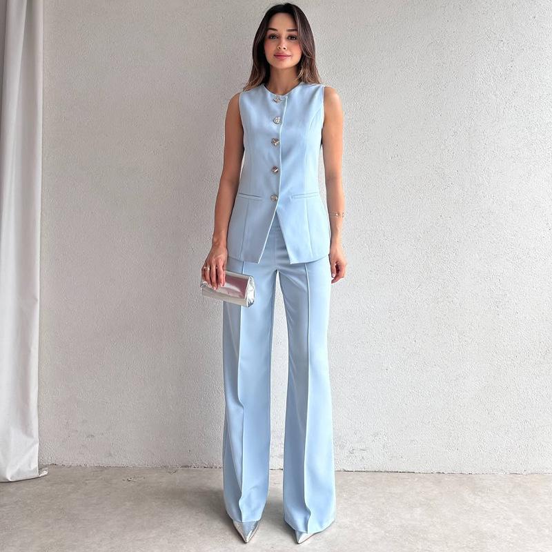 

Новий жіночий повсякденний комплект: однотонна блуза без рукавів на ґудзиках та штани прямого крою M небо синє кольору