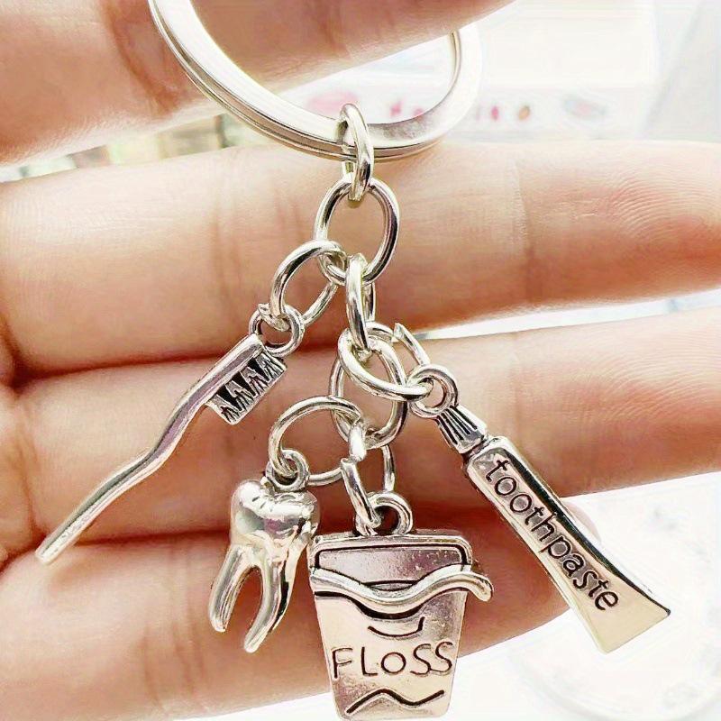 European and American Style Dental Care Keychain with Toothbrush, Toothpaste, and Floss - Creative Backpack Pendant Gift