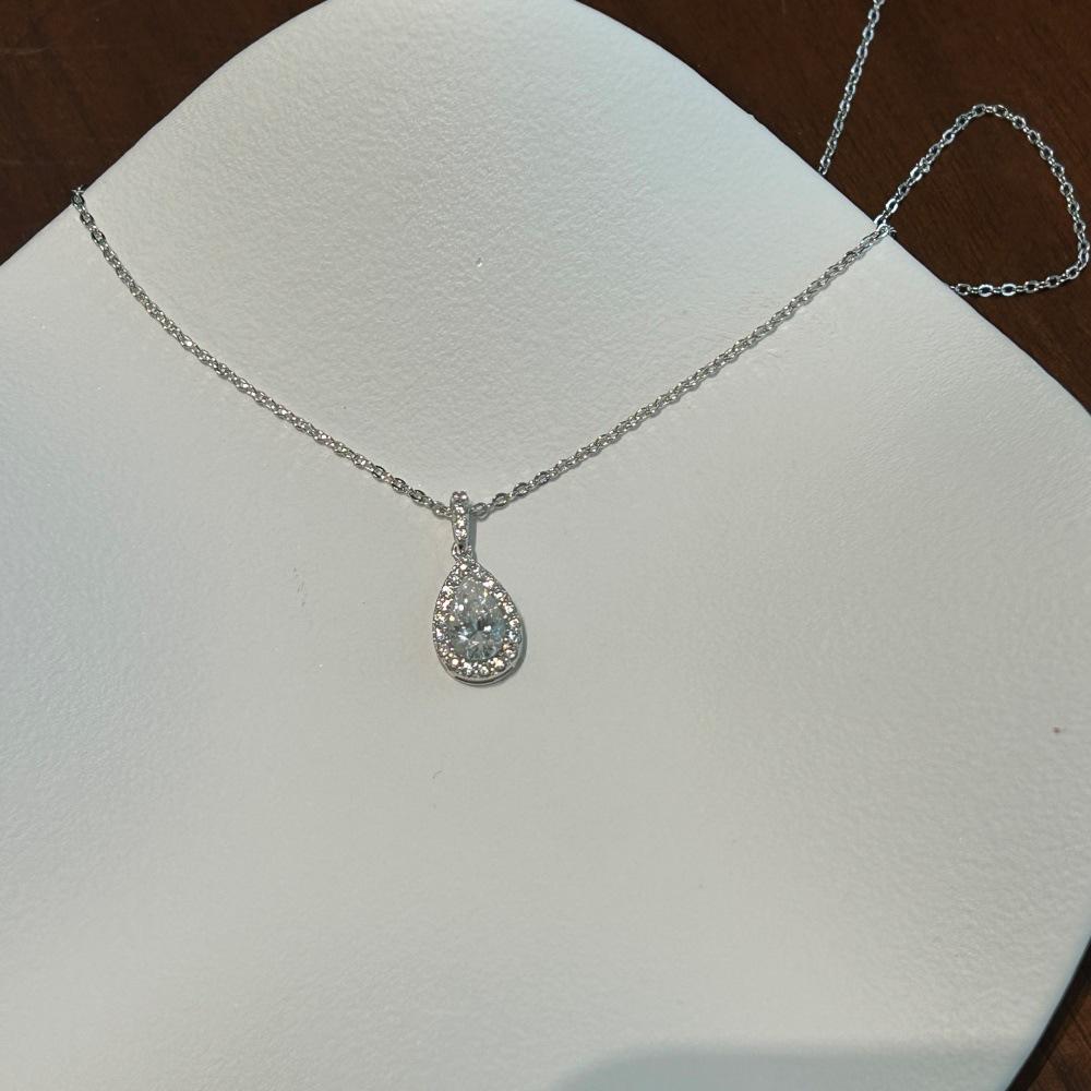 Sterling S925 Moissanite Water Drop Jewelry Set: Light Luxury Silver Ring, Earrings, and Necklace for Women.
