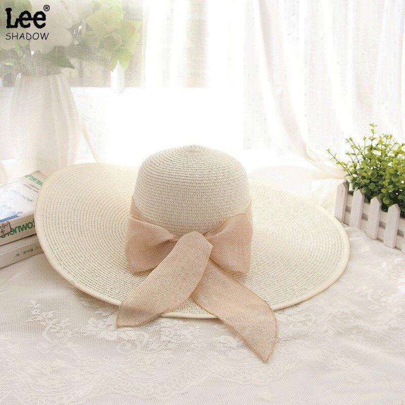 Cappello di paglia a tesa larga da donna estate protezione solare cappello a tesa larga da mare cappello da spiaggia con fiocco cappello da sole