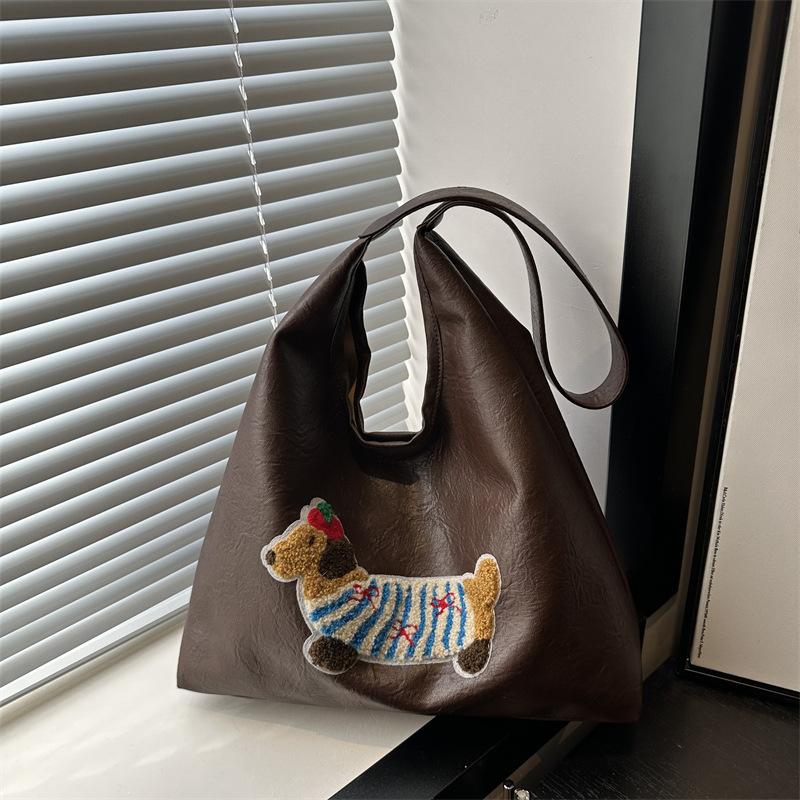 

Autumn and winter Korean version ins style new retro commuter shoulder bag female large capacity cartoon student class tote bag